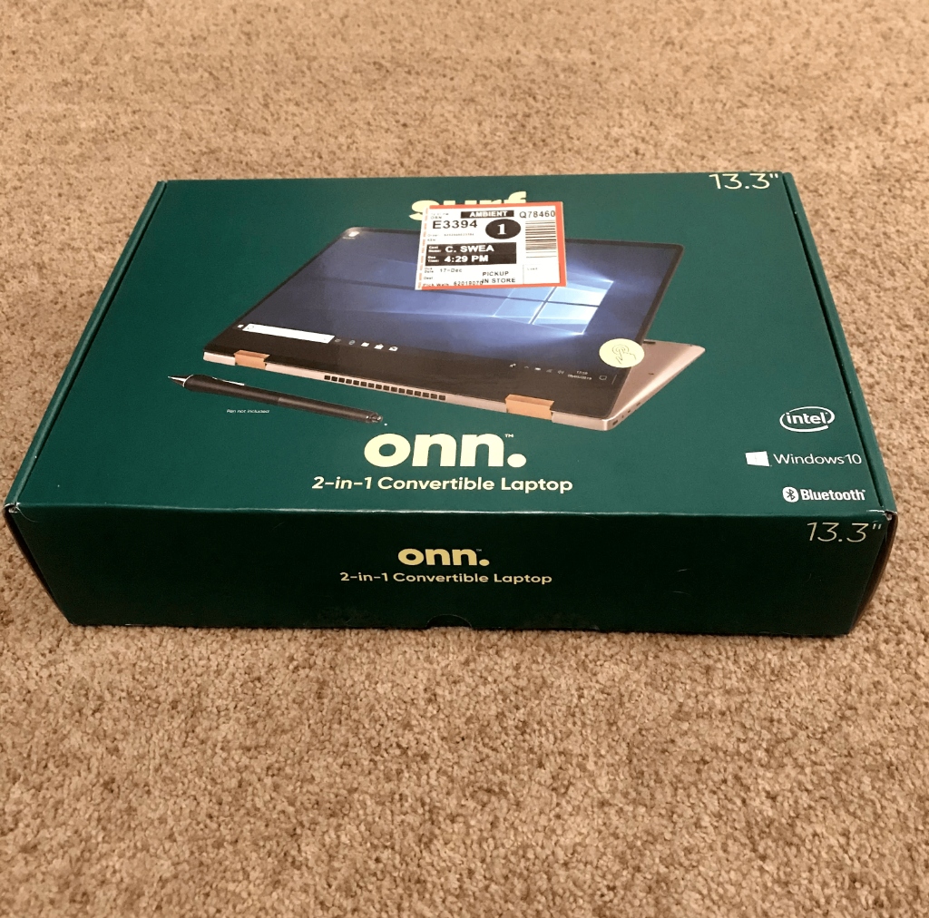 ONN 100002434 retail box front — dark teal onn. 2-in-1 Convertible Laptop packaging with Walmart pickup label